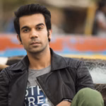 ऐक्टर राजकुमार राव ने जालंधर कोर्ट में किया सरेंडर, धार्मिक भावना भड़काने के केस में कोर्ट में पेश न होने पर अरेस्ट वारंट हुए थे जारी। जालंधर के JMIC जज श्रीजन शुक्ला की कोर्ट में सोमवार को धार्मिक भावना भड़काने के केस में ‘बहन होगी तेरी' फिल्म के हीरो राजकुमार राव ने सरेंडर कर दिया। कोर्ट में पेश न होने को लेकर राव को अरेस्ट वारंट जारी किए गए थे। केस की अगली सुनवाई 30 जुलाई को होगी। बचाव पक्ष के एडवोकेट दर्शन सिंह दयाल ने कोर्ट में दलील दी कि उनके क्लांइट को कोर्ट से राहत मिलने के बाद वह जांच में शामिल हो गए थे। पुलिस ने जांच पूरी कर चार्जशीट कोर्ट में फाइल कर दी थी, लेकिन जिस पते पर कोर्ट की ओर से समन भेजे गए थे वह वहां नहीं रहते थे। इसलिए समन न मिलने के कारण पेश न हो सके। उन्होंने दलील दी कि उनके क्लांइट के नोटिस में मामला आया तो उन्होंने कोर्ट में सरेंडर कर दिया। कोर्ट ने बचाव पक्ष की दलील से सहमत होते हुए राव की बेल मंजूर कर दी।